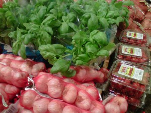 Garlic, tomatoes, basil in grocery store